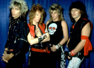 American guitarist and songwriter George Lynch, American musician and bassist Jeff Pilson, American drummer Mick Brown and American singer and musician Don Dokken, of the American glam metal band Dokken, pose for a group portrait circa 1983 in San Francisco.