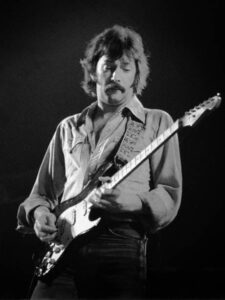 Eric Clapton performing on stage in Rotterdam, Netherlands, 1976
