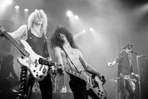 Duff McKagan, Slash, and Axl Rose, of the group Guns 'n' Roses, performing in concert at the Ritz, New York, New York, February 2, 1988.