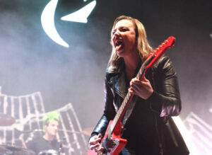 : Lizzy Hale of Halestorm performs on stage at The O2 Arena on December 12, 2022 in London, England.