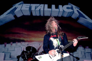 James Hetfield of Metallica singing and playing his guitar on 4/5/86 in Chicago, Il. 