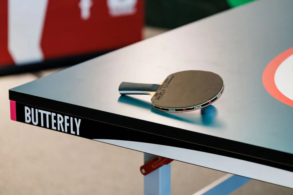 New Jersey's Favorite Olympic Sport is Table Tennis, here is an image of a paddle on a table