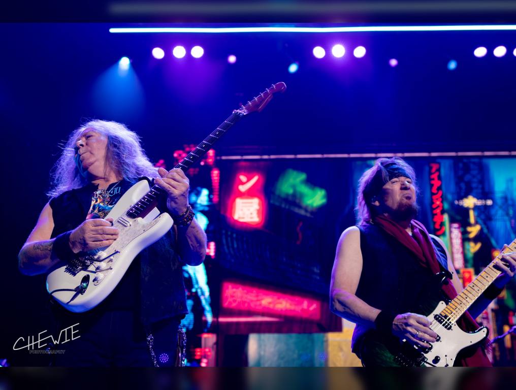 Iron Maiden's guitarists Adrian Smith and Dave Murray play next to each other